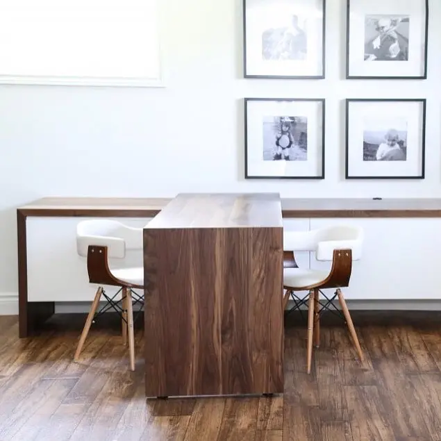 Walnut office with countertop and desk cabinetry by Heirlooms Custom Cabinetry