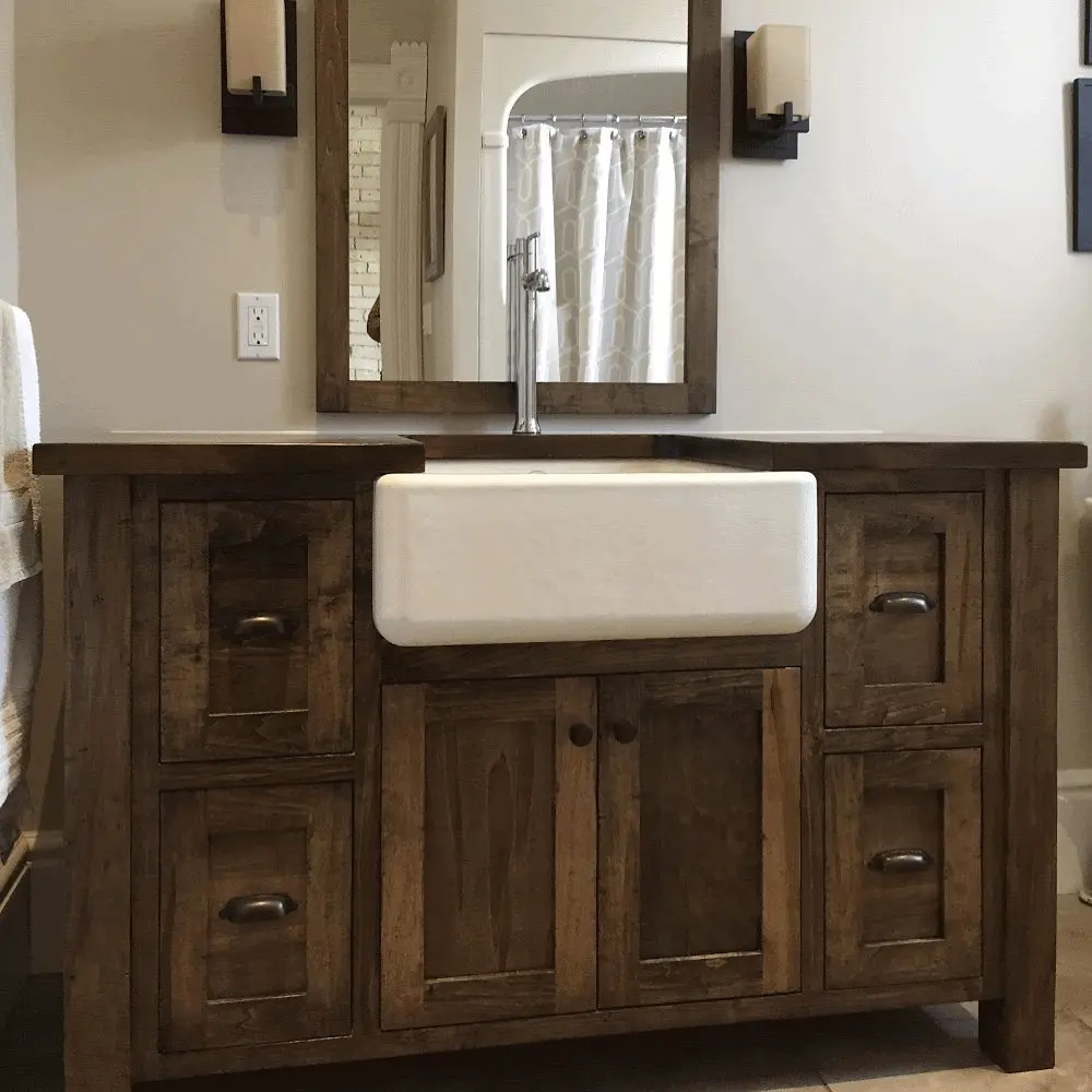 Stained vanity with vanity cabinetry by Heirlooms Custom Cabinetry