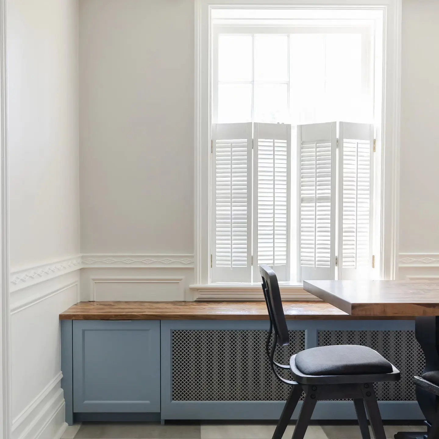 Built In with vented and bench cabinetry by Heirlooms Custom Cabinetry