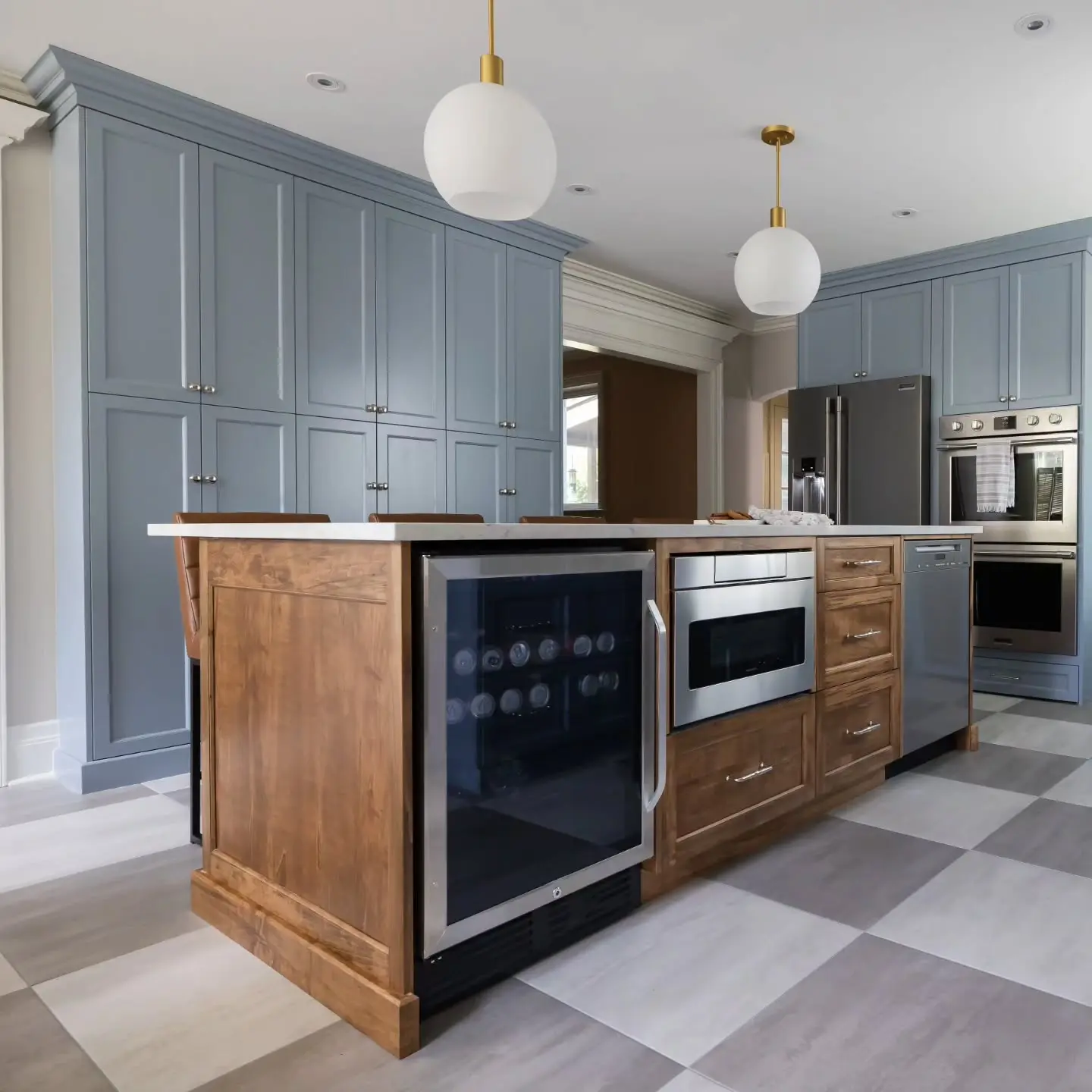 Stained kitchen cabinetry by Heirlooms Custom Cabinetry